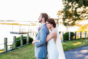 bride and groom at waterfront
